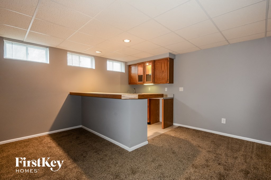 a kitchen with a counter top and a table