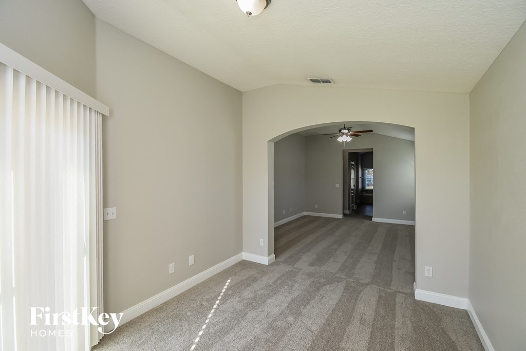 the living room and dining room are spacious and open to the hallway