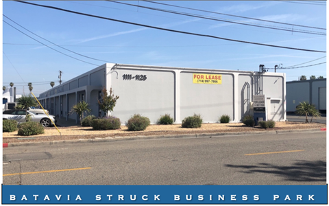 A building with a sign that says "For Lease" is located in Batavia Struck Business Park.