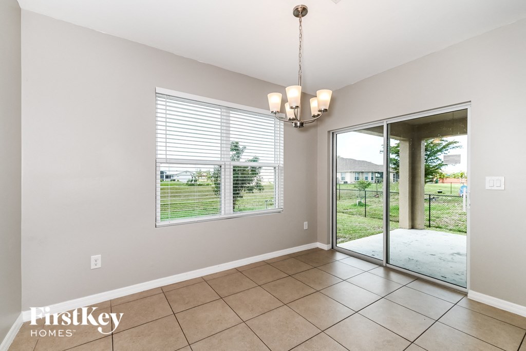 the living room and dining room are spacious and open to the backyard