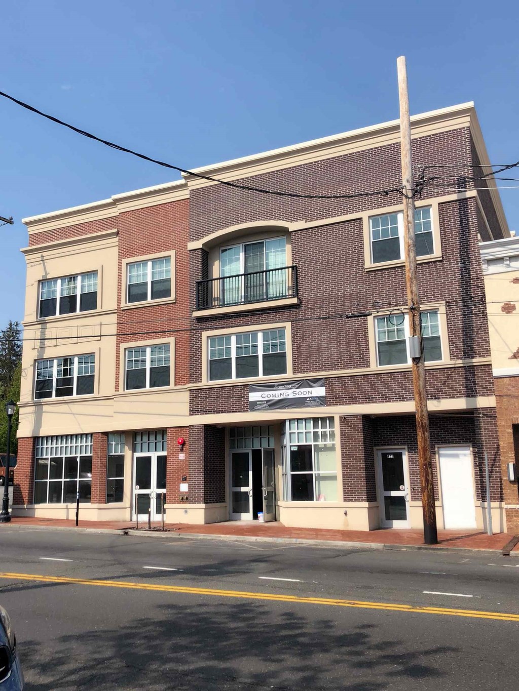 a building on the corner of a city street