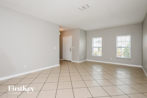 the living room and dining room are spacious and clean