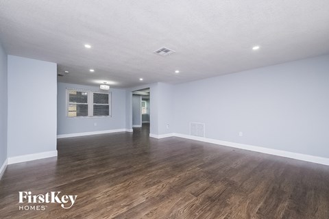 the living room is clean and ready to be staged