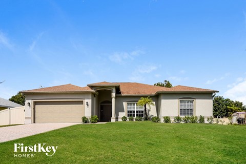 a house with a lawn in front of it