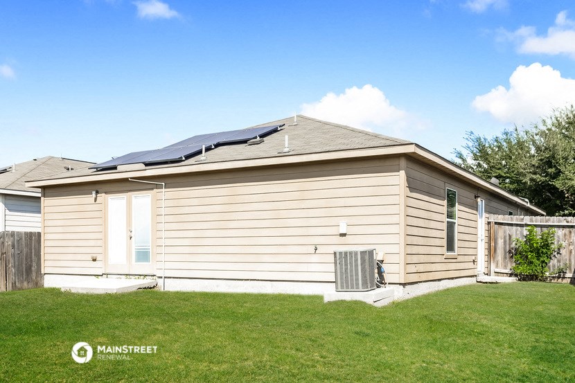 a house with solar panels on the roof