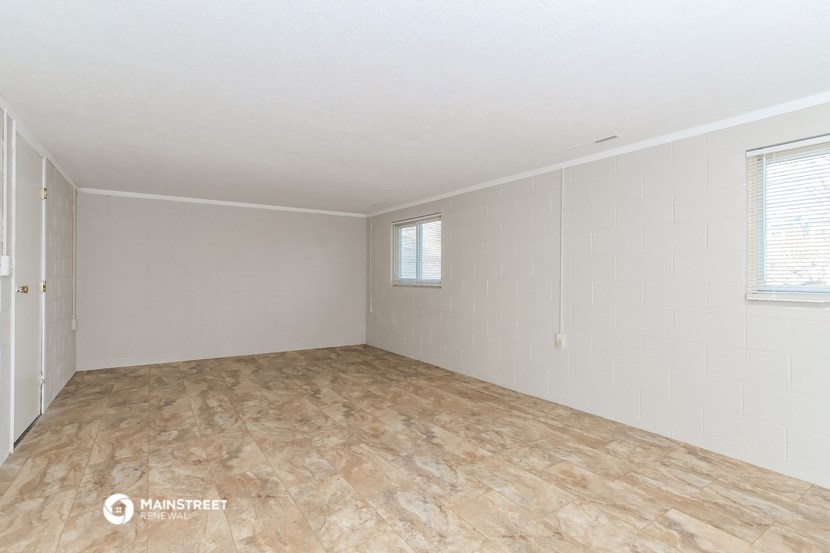 the living room is clean and ready for us to move in