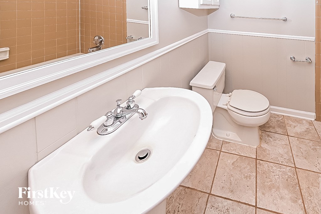 a bathroom with a sink and a toilet