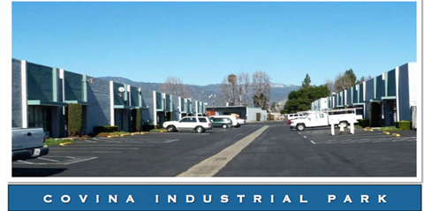 A large industrial park with a clear blue sky above.