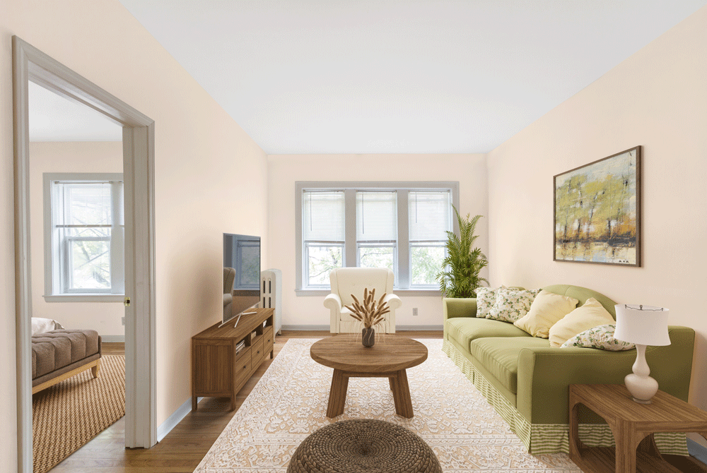 a living room with a green couch