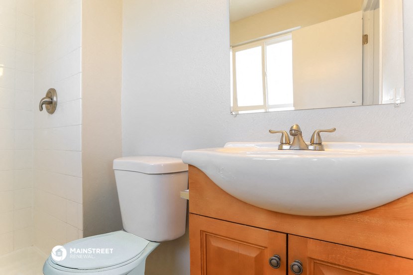 a bathroom with a sink and a toilet