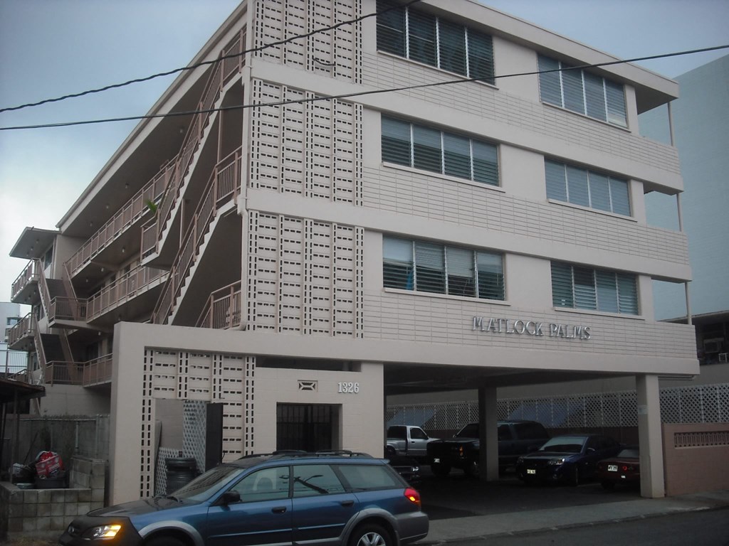 a building with a car parked in front of it