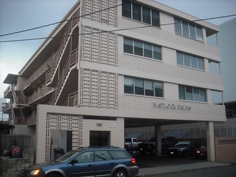 a building with a car parked in front of it