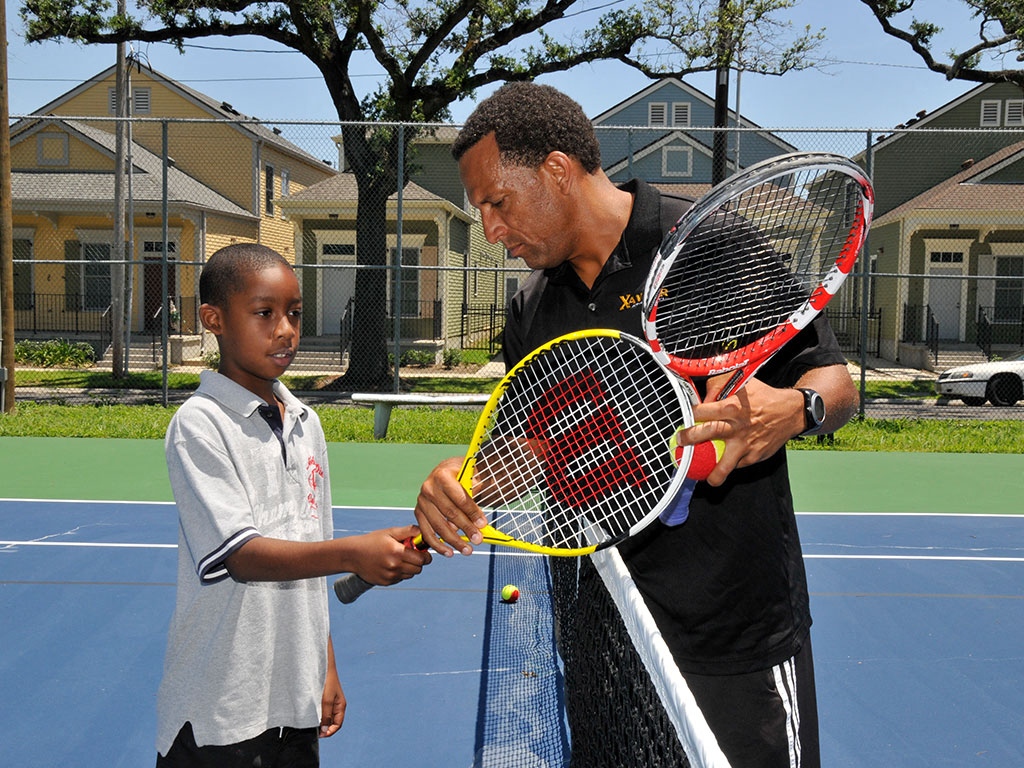 Exterior tennis court with players_Lafitte,New Orleans, LA