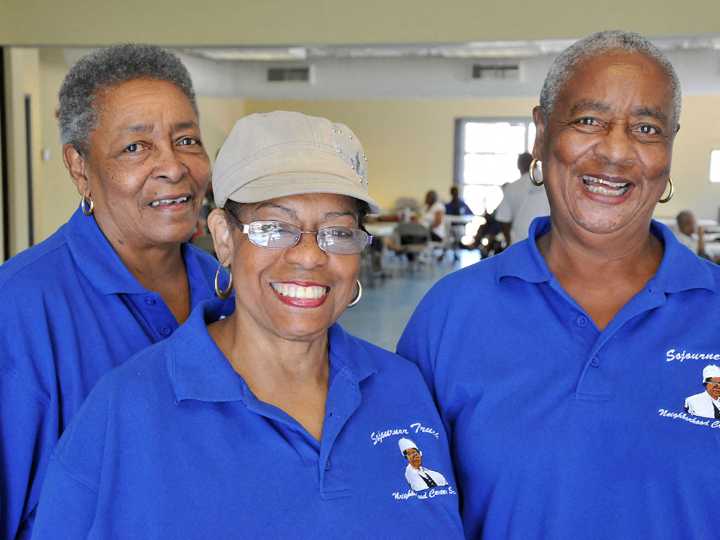 Women smiling inside community room_Lafitte,New Orleans, LA