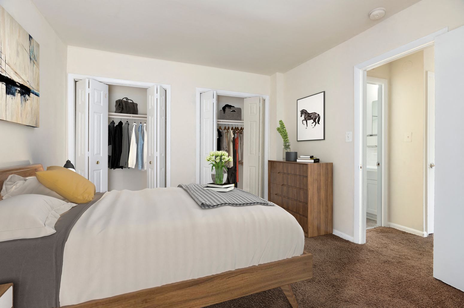a bedroom with a large bed and a closet