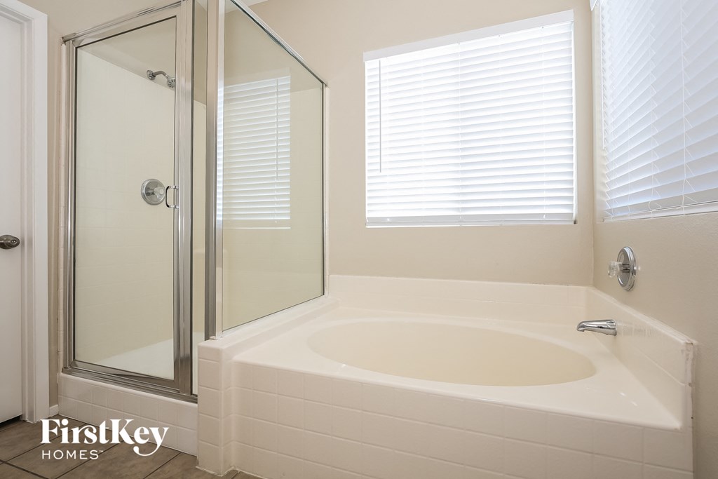 a bathroom with a sink and a shower