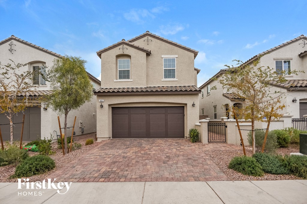 A house with a garage is for sale by FirstKey Homes.