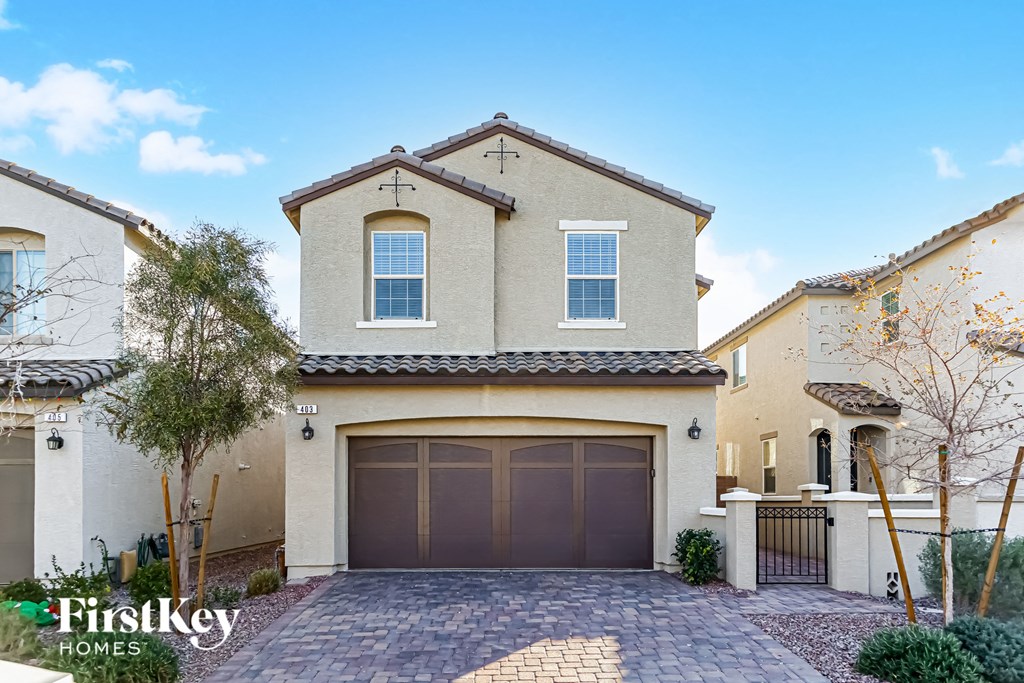 A house with a garage is for sale by FirstKey Homes.