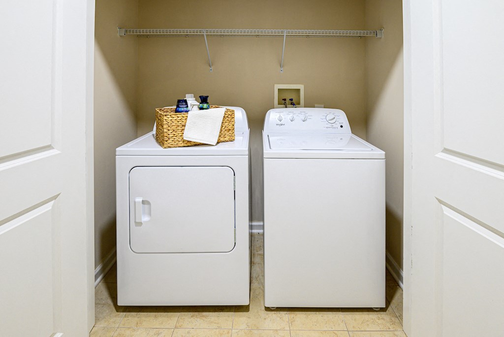 a washer and dryer in the laundry room of a home