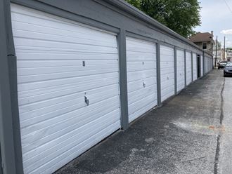 a row of garage doors on a city street