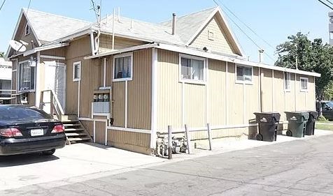 a house with a car parked in front of it