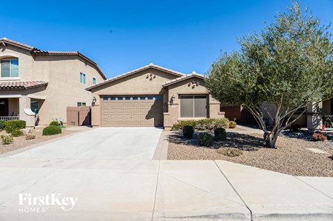 a house with a driveway and a garage door
