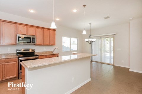 a kitchen with a counter top and a sink