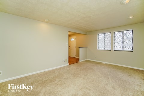 the living room and dining room are spacious and clean