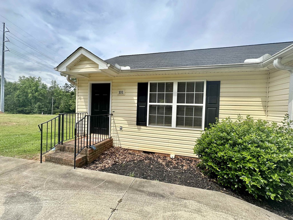A house with the number 101 on the front door.