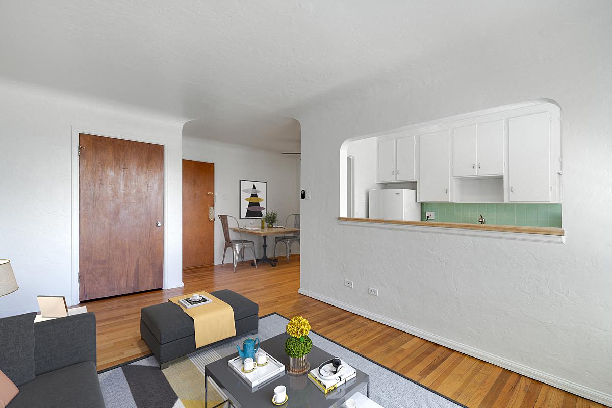 a living room with a couch and a table