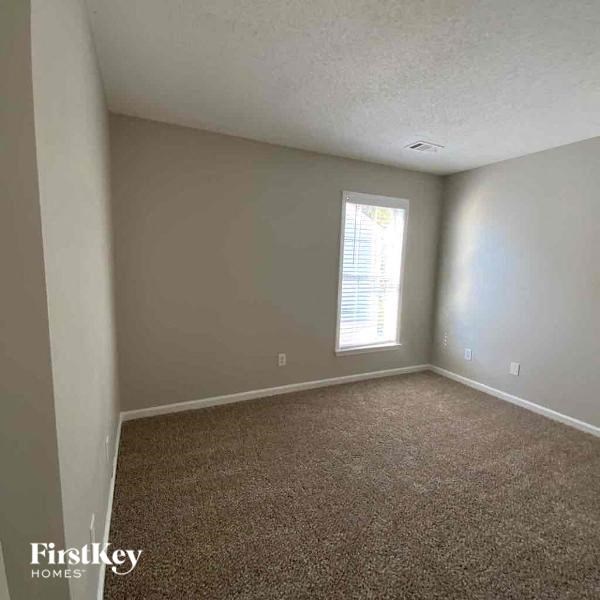 an empty room with a window in it