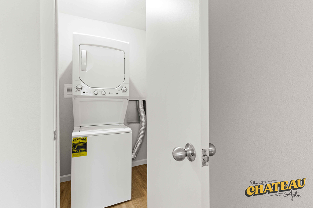 a laundry room with a washer and dryer in it