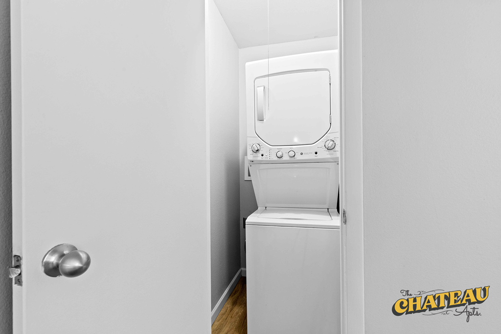 a small laundry room with a washer and dryer