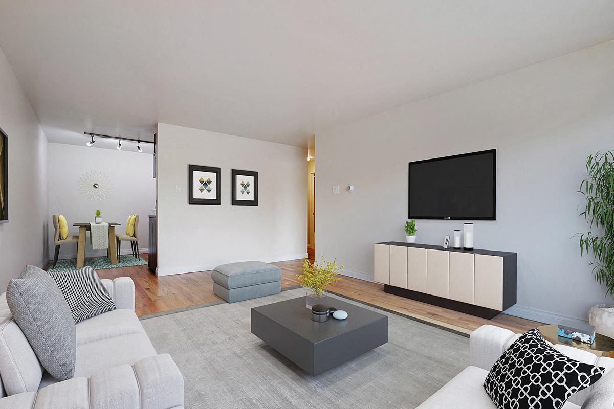 a living room with a couch and a table