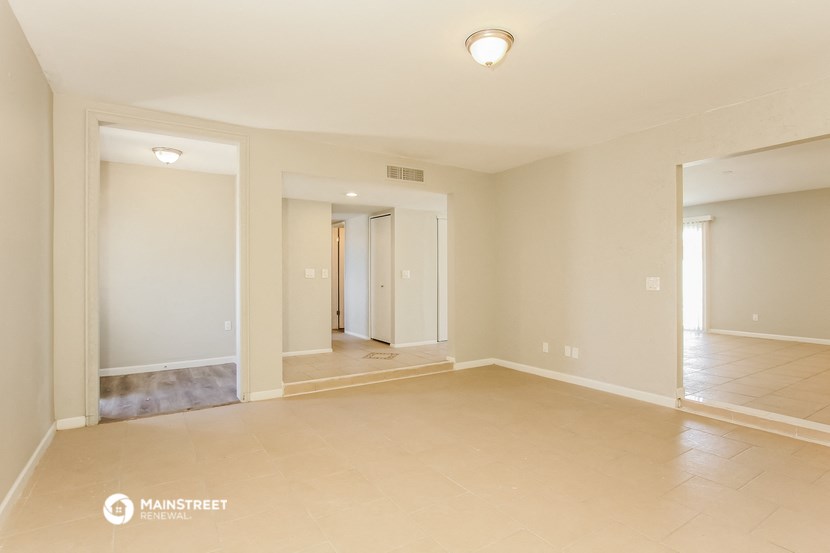 the spacious living room and dining room are empty and ready for you to use