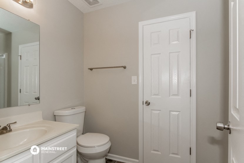 a small bathroom with a toilet and a sink