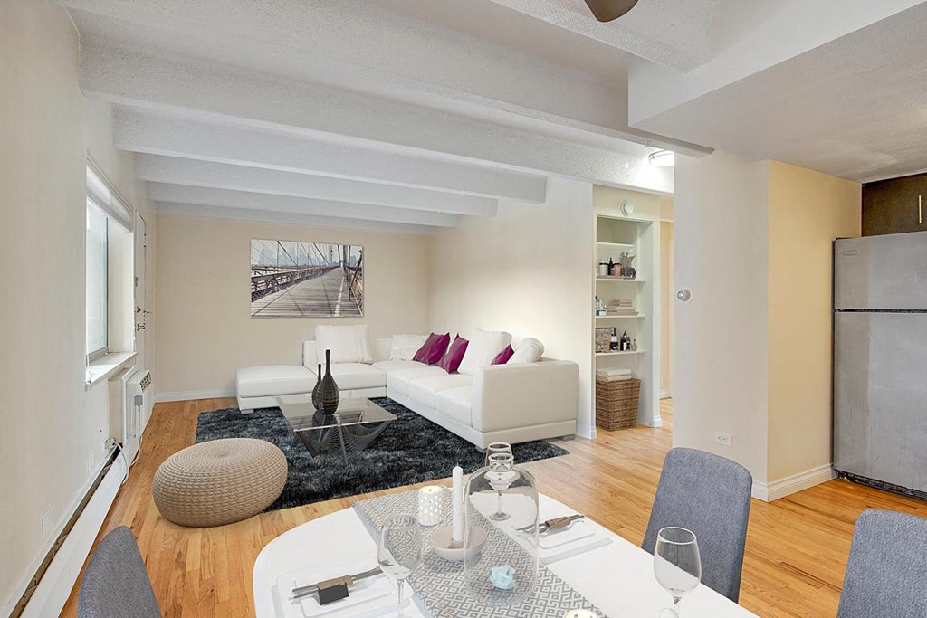 a living room with a couch and a table