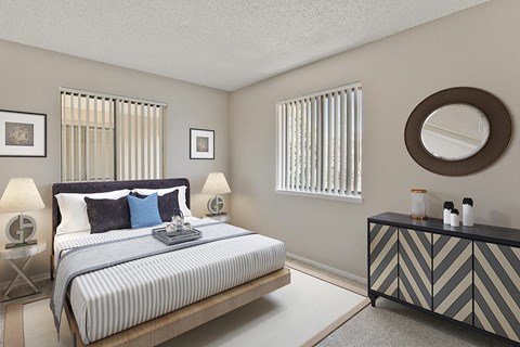 a bedroom with a bed and a dresser