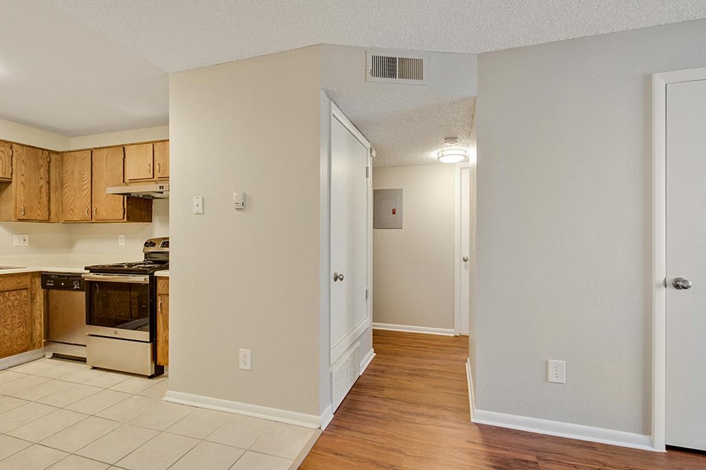 a view of a kitchen and a living room