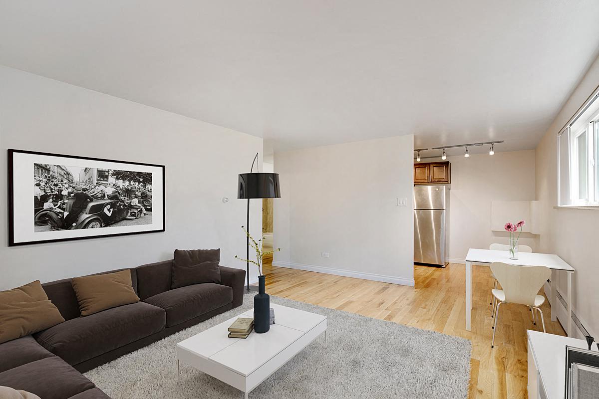 a living room with a couch and a table