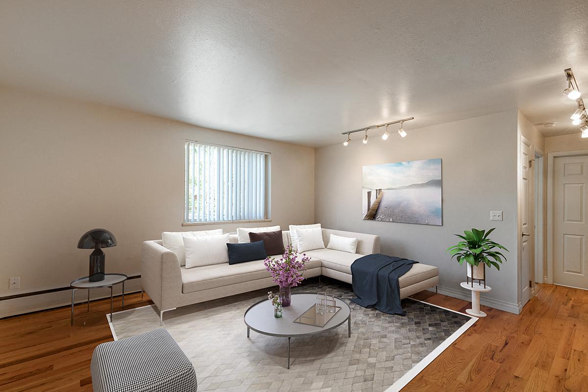 a living room with a couch and a table