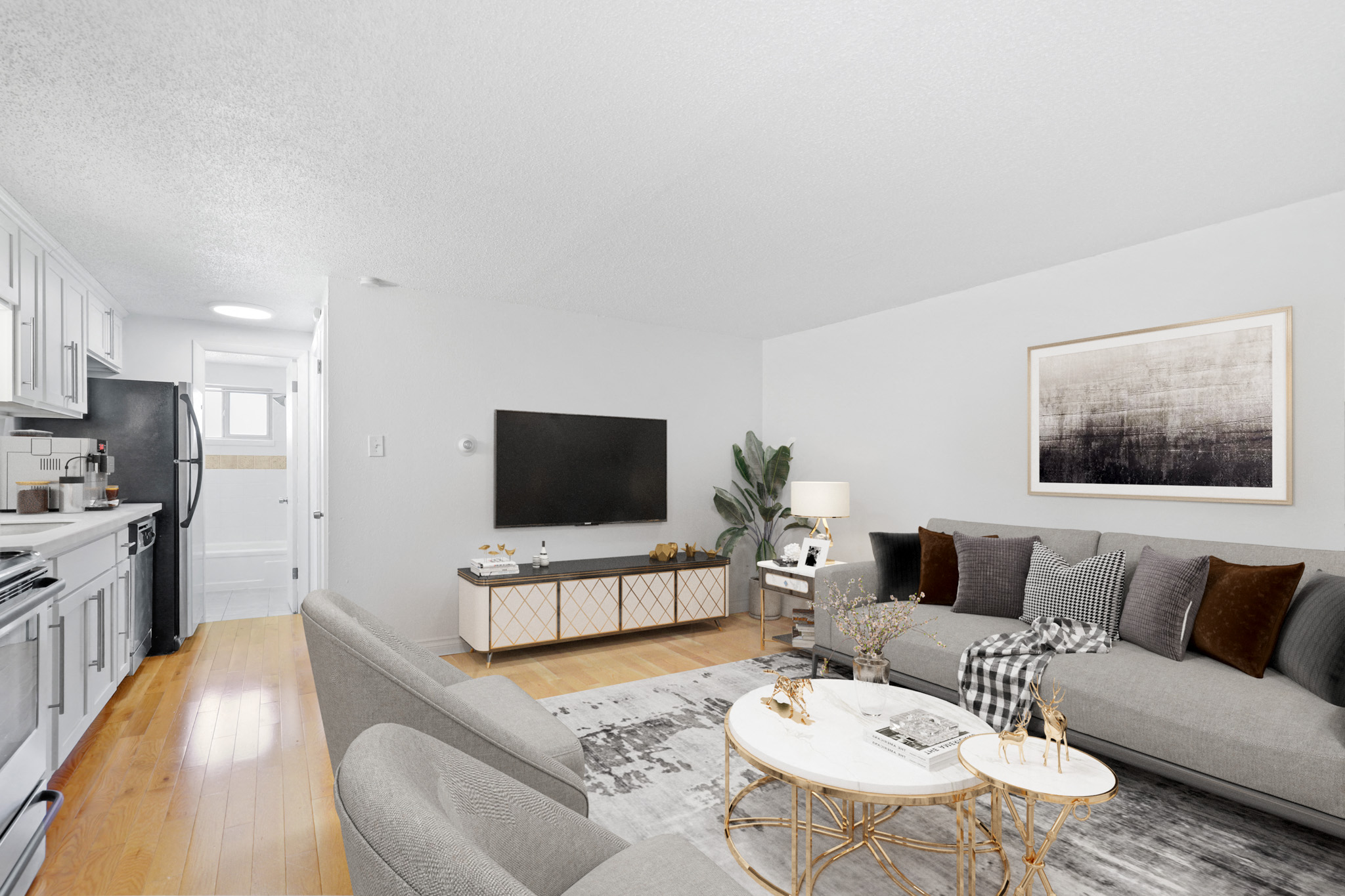 a living room with a couch and a table and a television