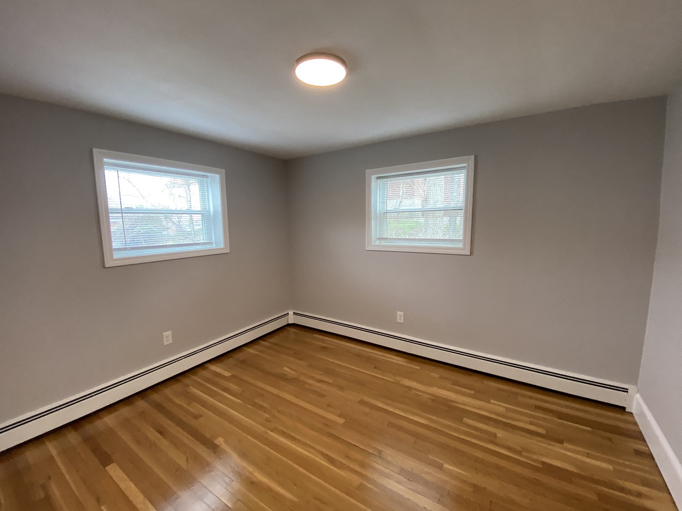 Bedroom with hardwood floors