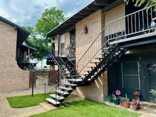 a house with stairs on the side of it
