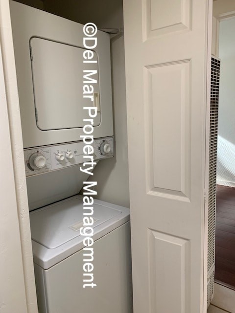 A white door with a washing machine and dryer in it.