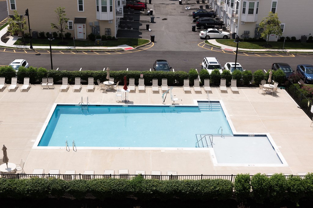 a swimming pool in the middle of a parking lot