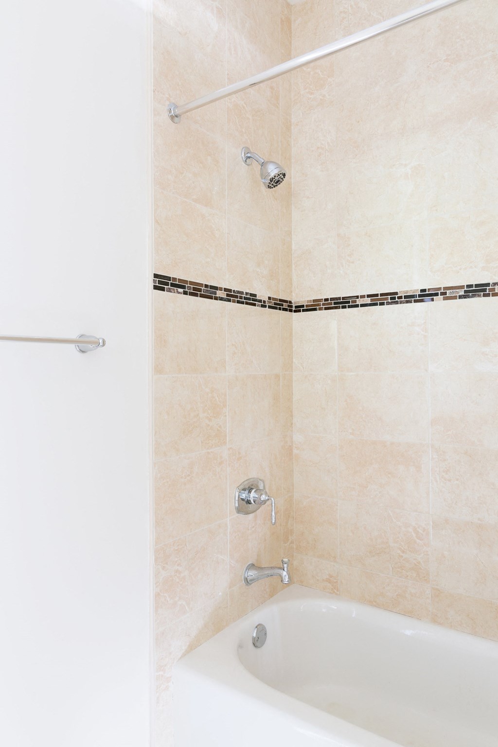 a bathroom with a tub and a shower curtain