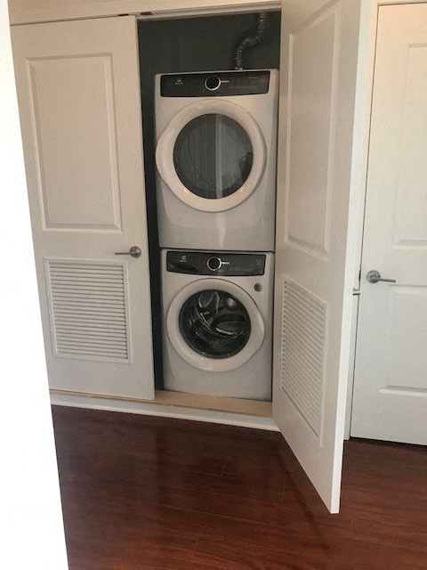 a washer and dryer in a small closet