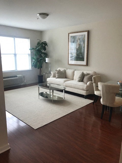 a living room with a couch and a table