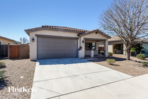 a house with a driveway and a garage door